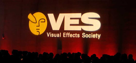 VES Logo Projected on Red Curtains